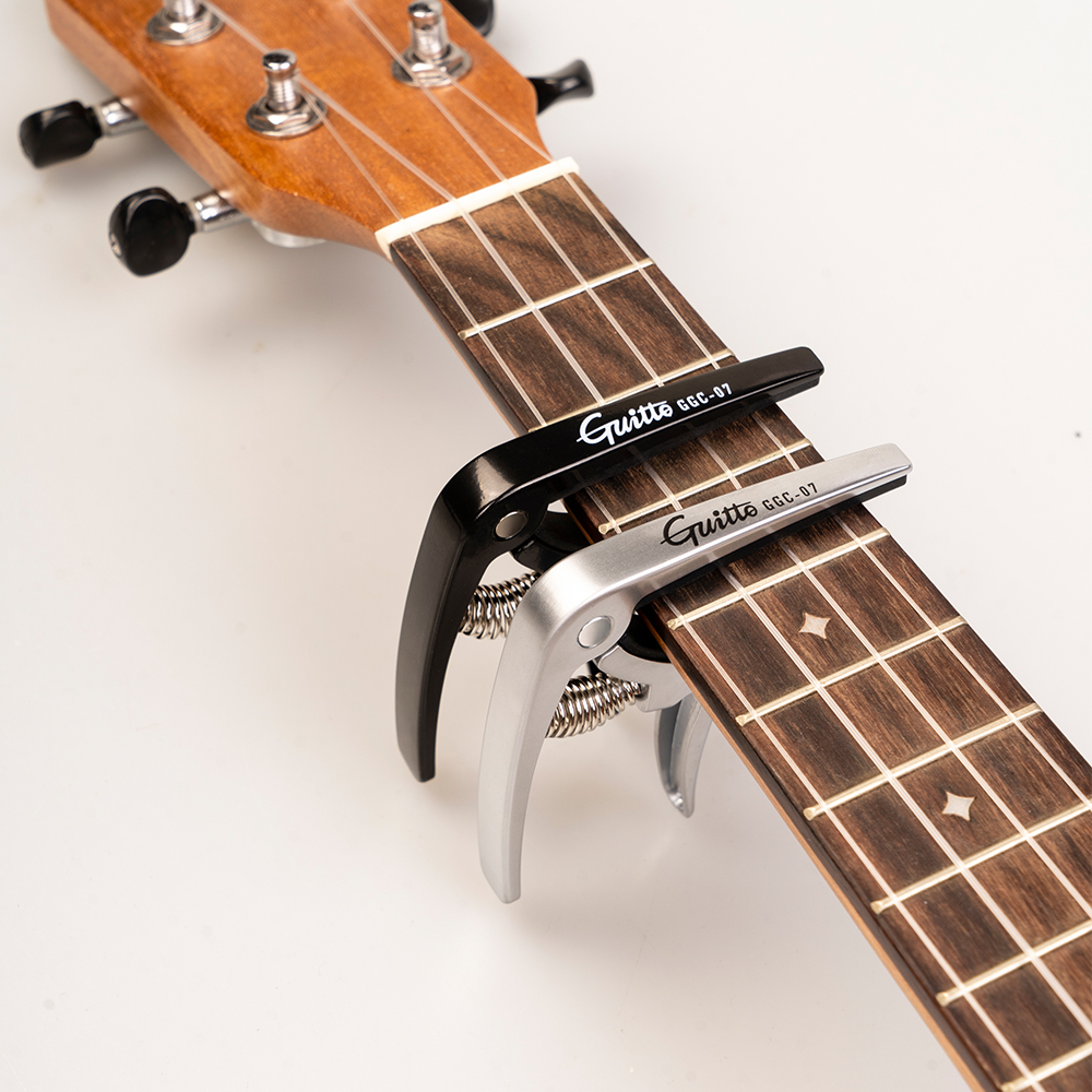 GUITTO GGC-07 Ukulele Capo Qui – Musical Instrument Art Bewertung und Preis