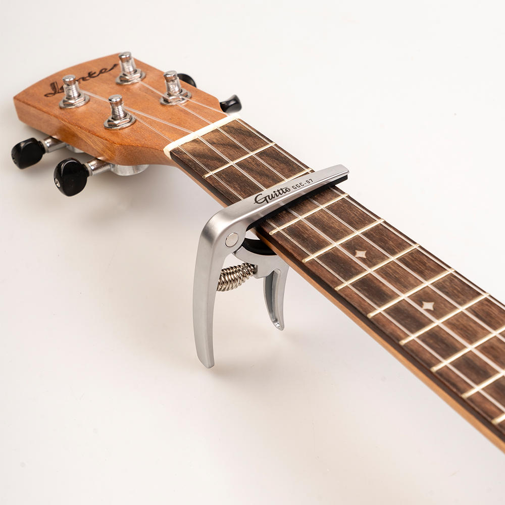 GUITTO GGC-07 Ukulele Capo Qui – Musical Instrument Art Bewertung und Preis